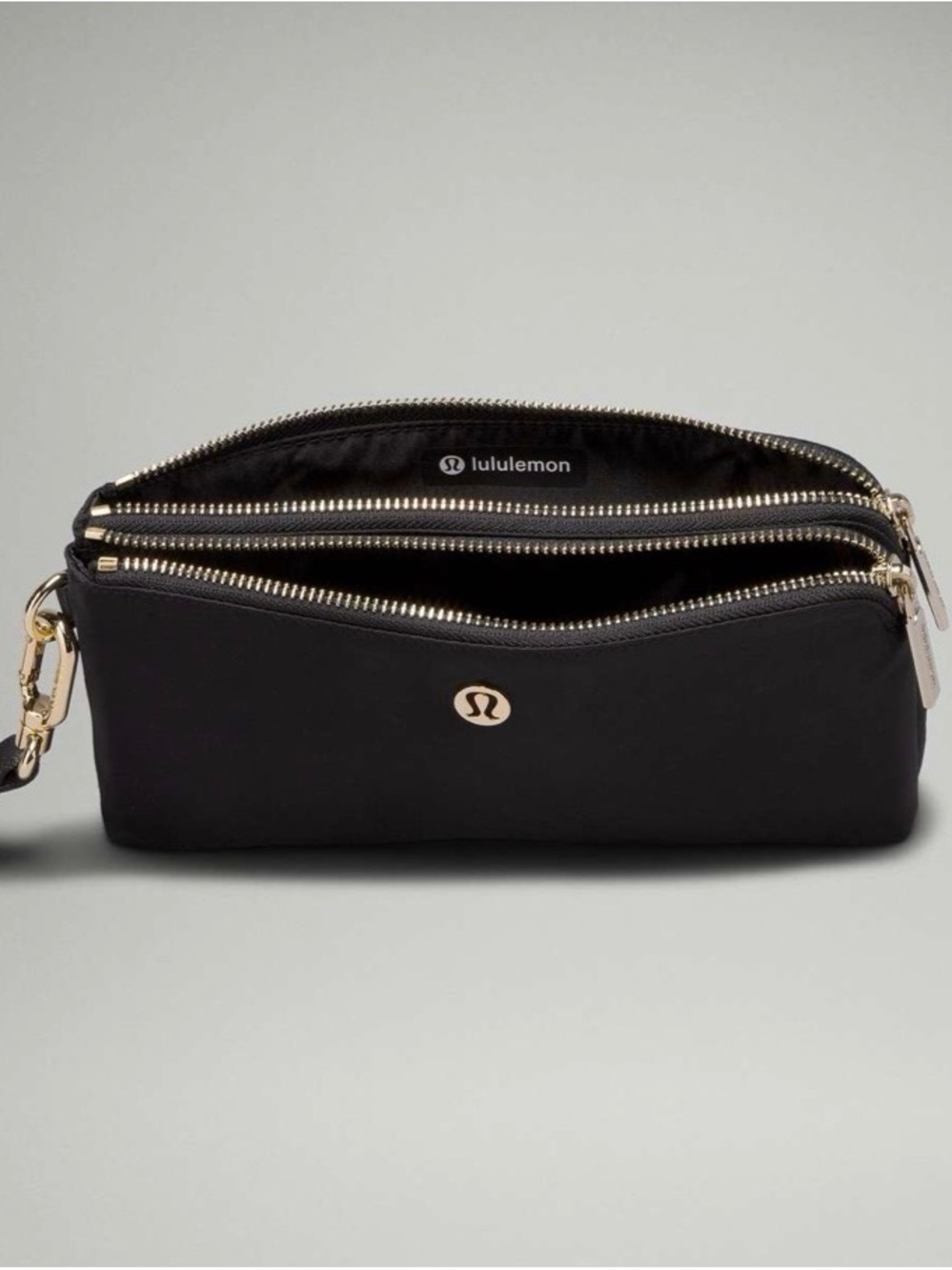 lululemon athletica Curved Wristlet in Black with Gold Logo Accent